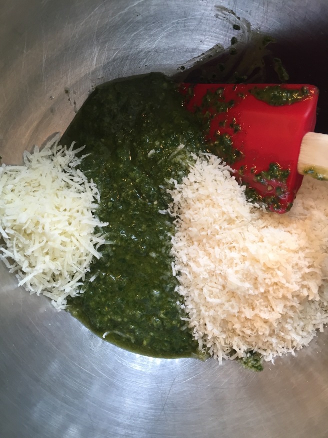 Parmesan and romano cheeses are added to the basil mixture.