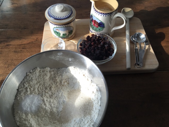 Adding sugar, salt, and baking powder to flour/butter mixture