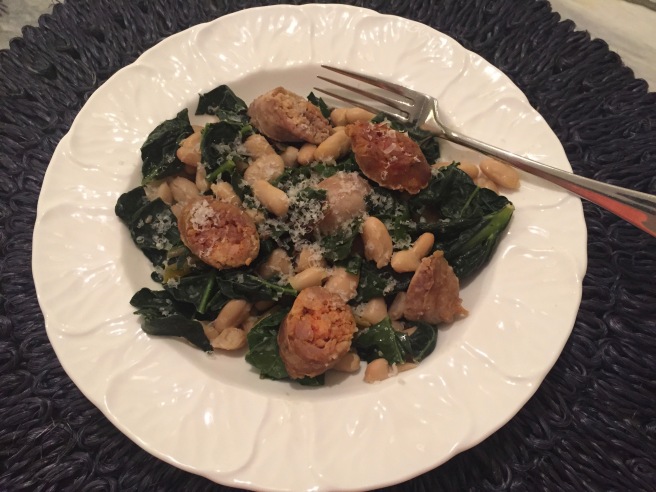 Italian sausage, beans, and greens in a bowl
